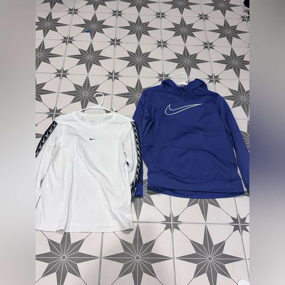 Nike purple high neck sweatshirt and Nike white long sleeve shirt